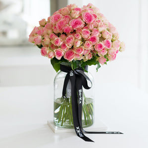 pink rose bouquet in a glass vase